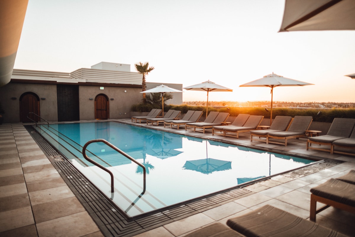 Pool at twilight kept pristine by Allure Pools Service and Repair